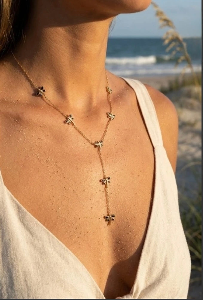 collier papillon femme acier inoxydable noir porté cou plage