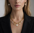 Collier doré pendentifs cœur perle femme